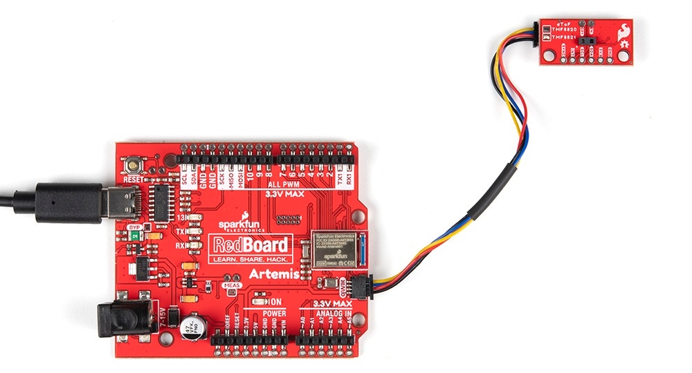 A SparkFun Qwiic Mini dToF Imager - TMF8821 ready to deliver distance measurement data to a RedBoard Artemis.